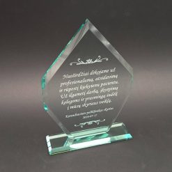 Smailėjanti stiklinė padėkos statulėlė su graviruotu tekstu ant skaidraus pagrindo.