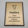 Aukso atspalvio padėka kolektyvui tamsiame rėmelyje.