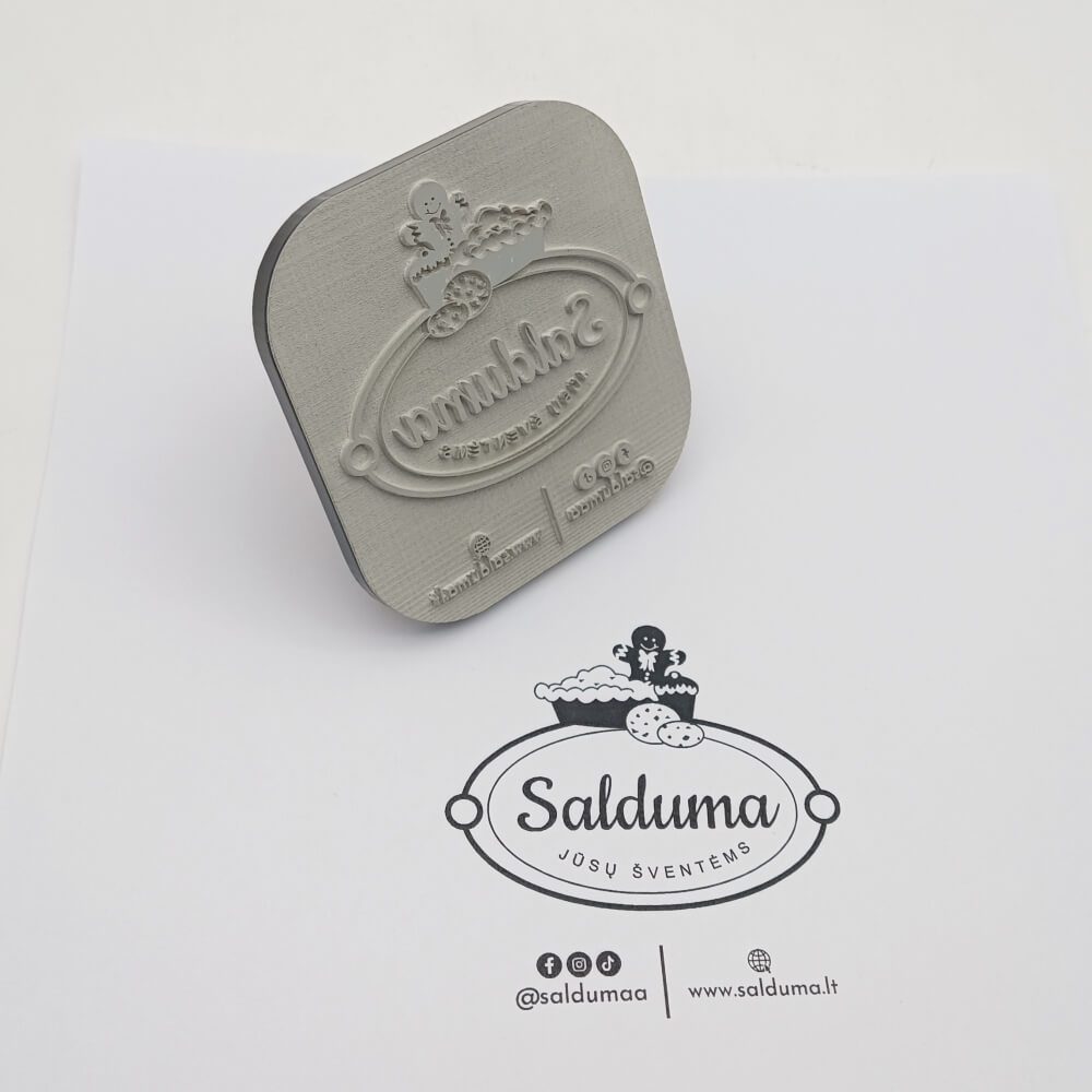 Metalinė „Salduma“ antspaudo klišė ir jos atspaudas