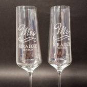 Graviruotos šampano taurės jaunavedžiams su pavardėmis