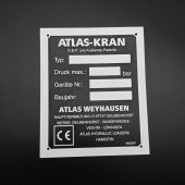 Juoda „ATLAS-KRAN“ įrangos identifikavimo lentelė
